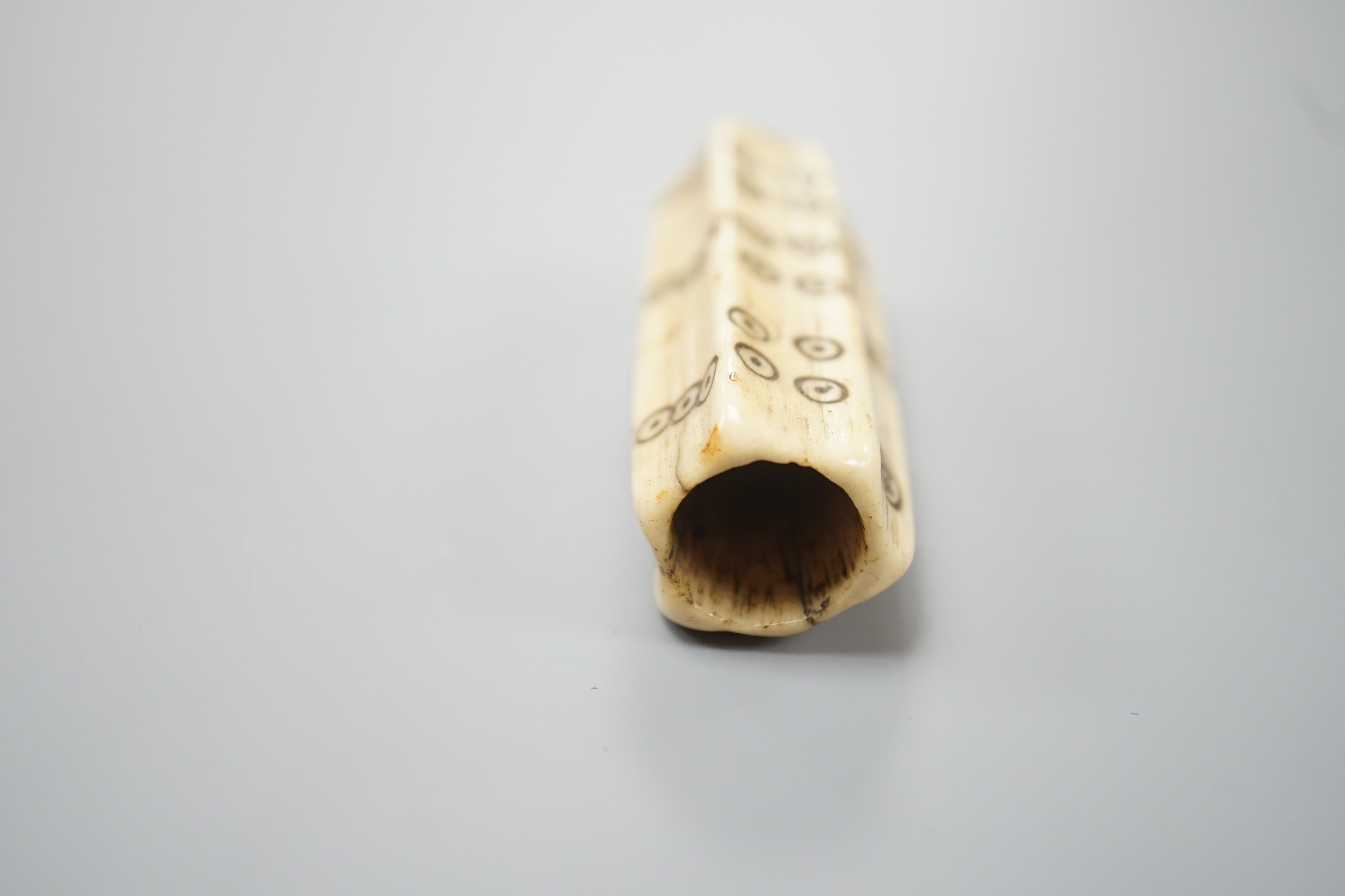 An early European bone six sided long dice, 6.8cm, cf. a similar example in the British Museum No. 1871,0910.2